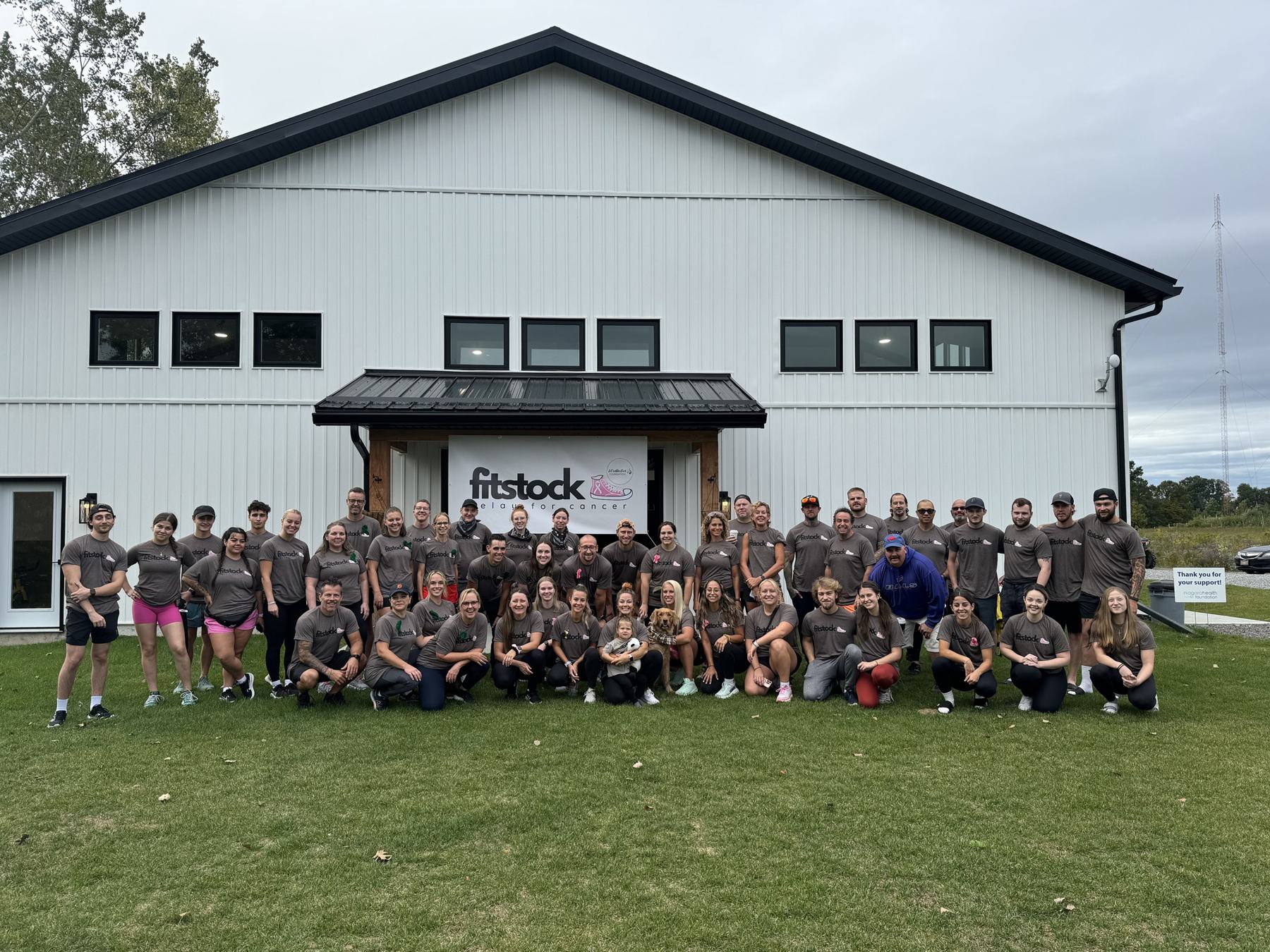 The FITSTOCK crew in grey shirts in front of The Yard